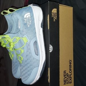 Size 8 North Face Beta Blue,white and sharp green shoe laces water sneakers.
